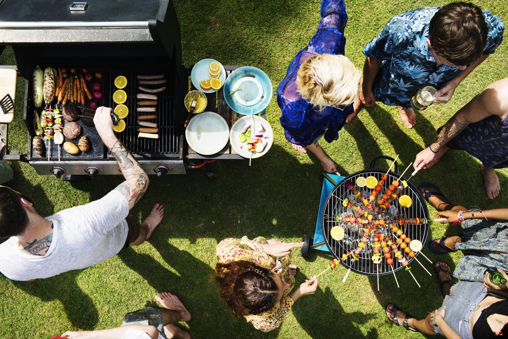 Friends Grilling outdoors - Franklin Communities